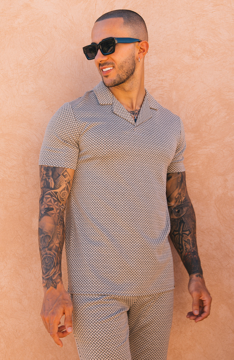 Model is 5'10, Chest 102cm wearing size Small