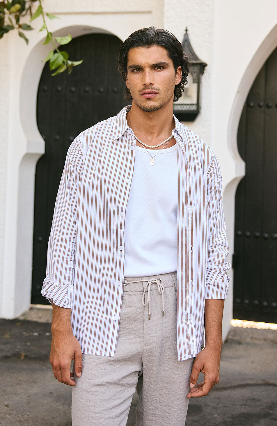 Model is 5'11 with size S chest, wearing size S