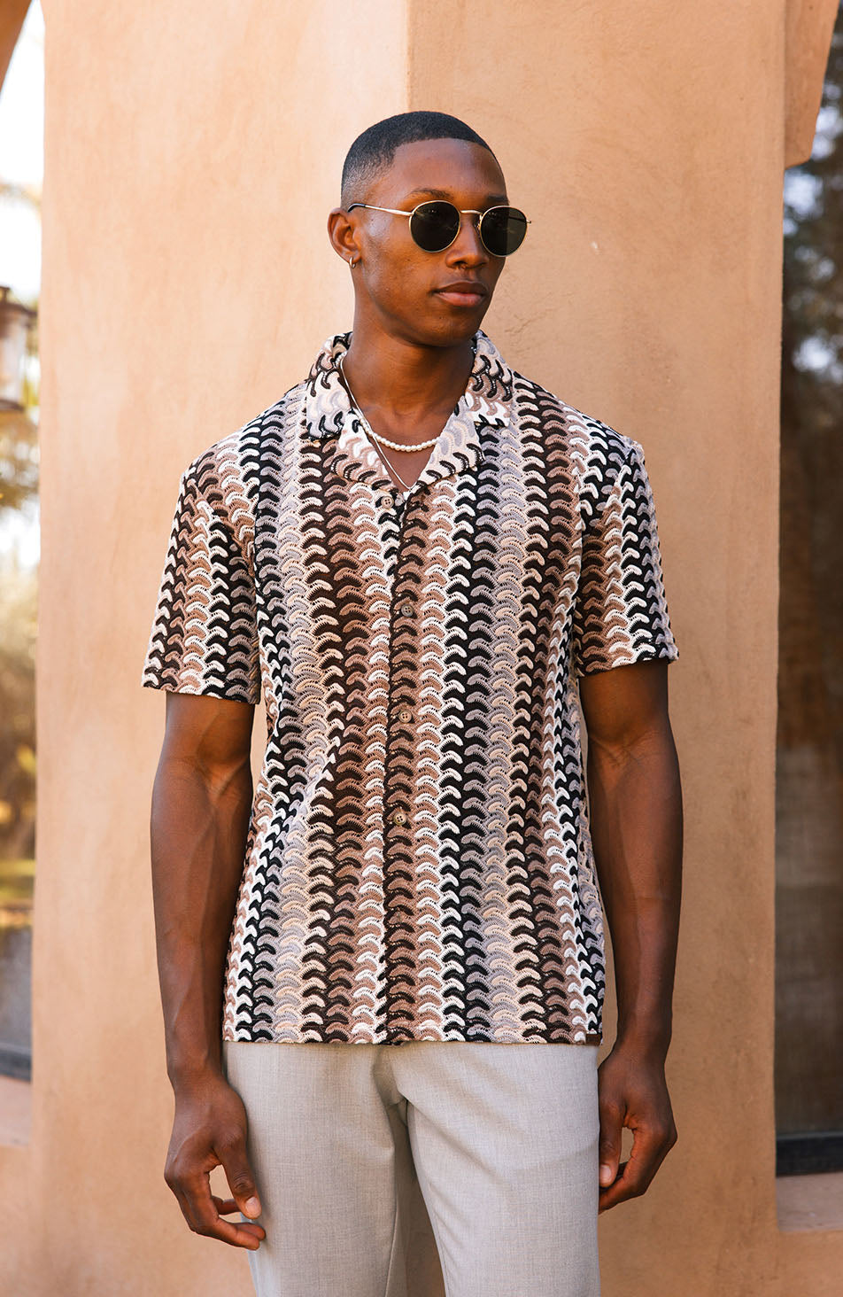 Model is 6'1 with size S chest, wearing S