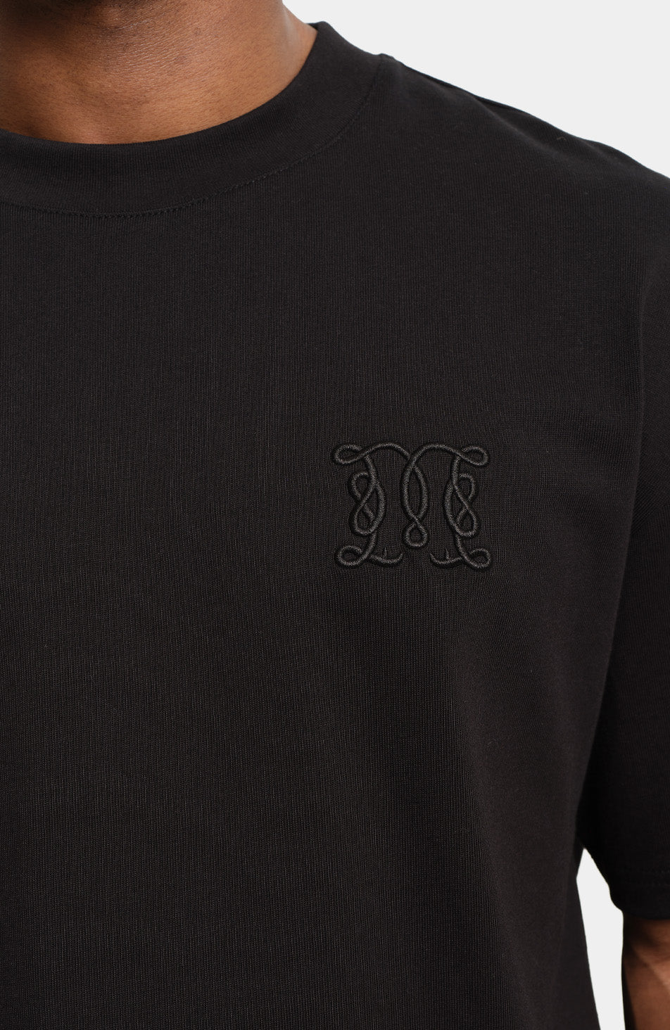 Embossed Monogram Back Logo T-shirt in Black