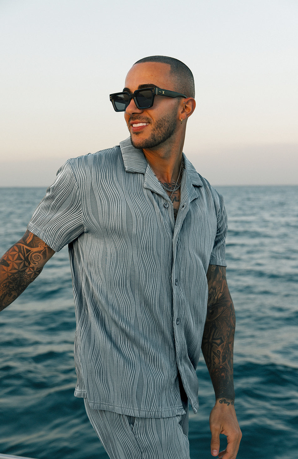 Model is 5'10, Chest 102cm wearing size Small